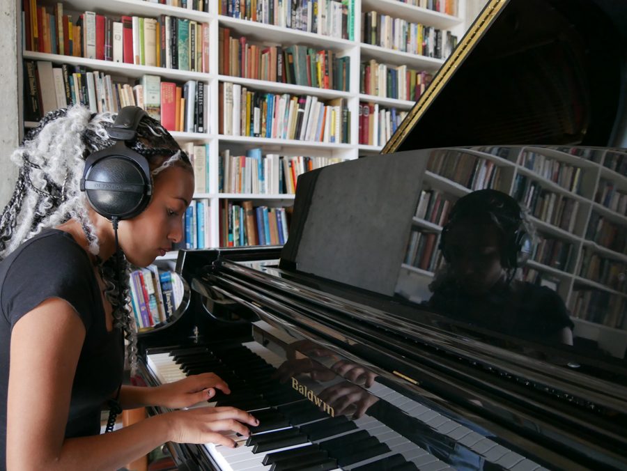 Nandi playing piano